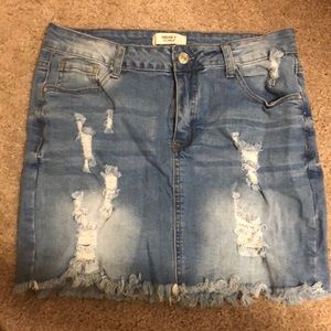 ripped blue jean skirt